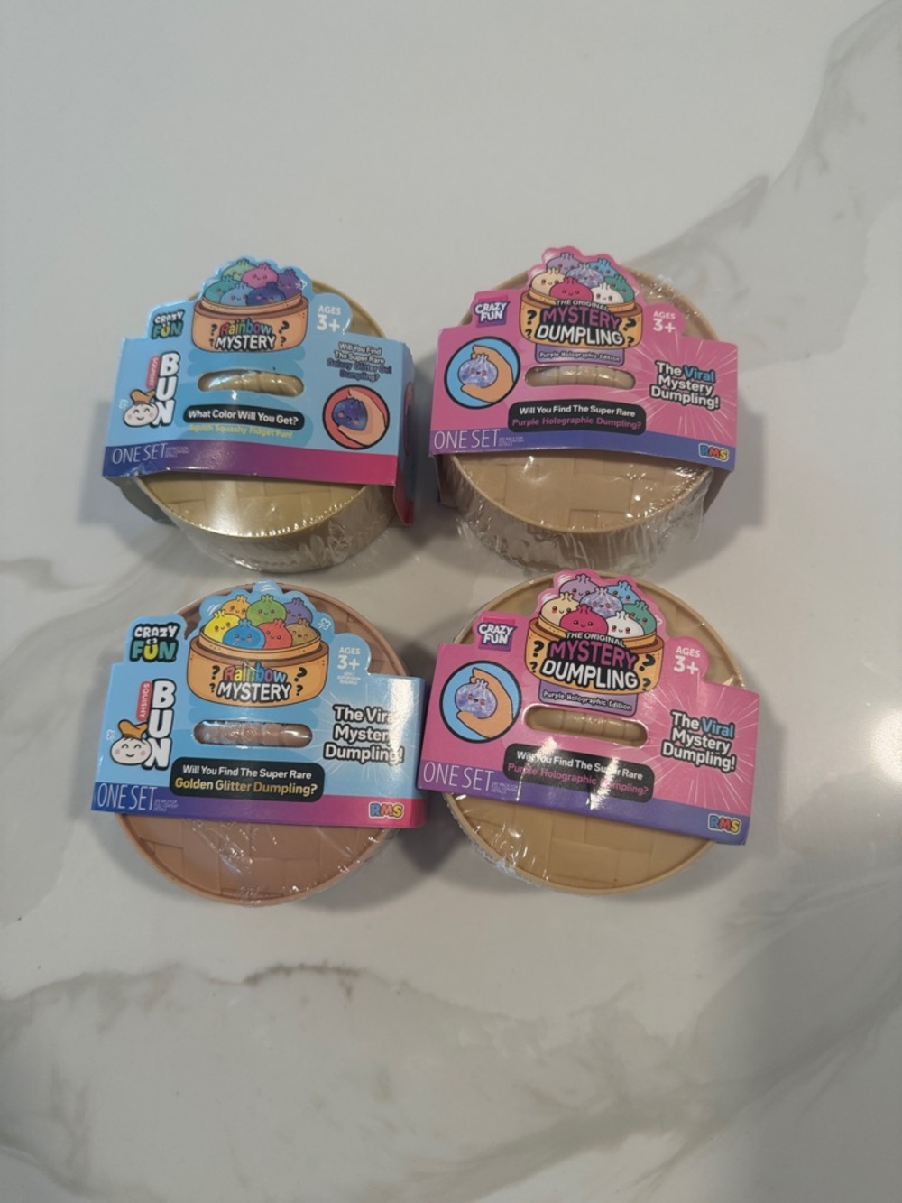 The Original VIRAL Mystery Dumpling 2 Halographic/2 Rainbow Mystery